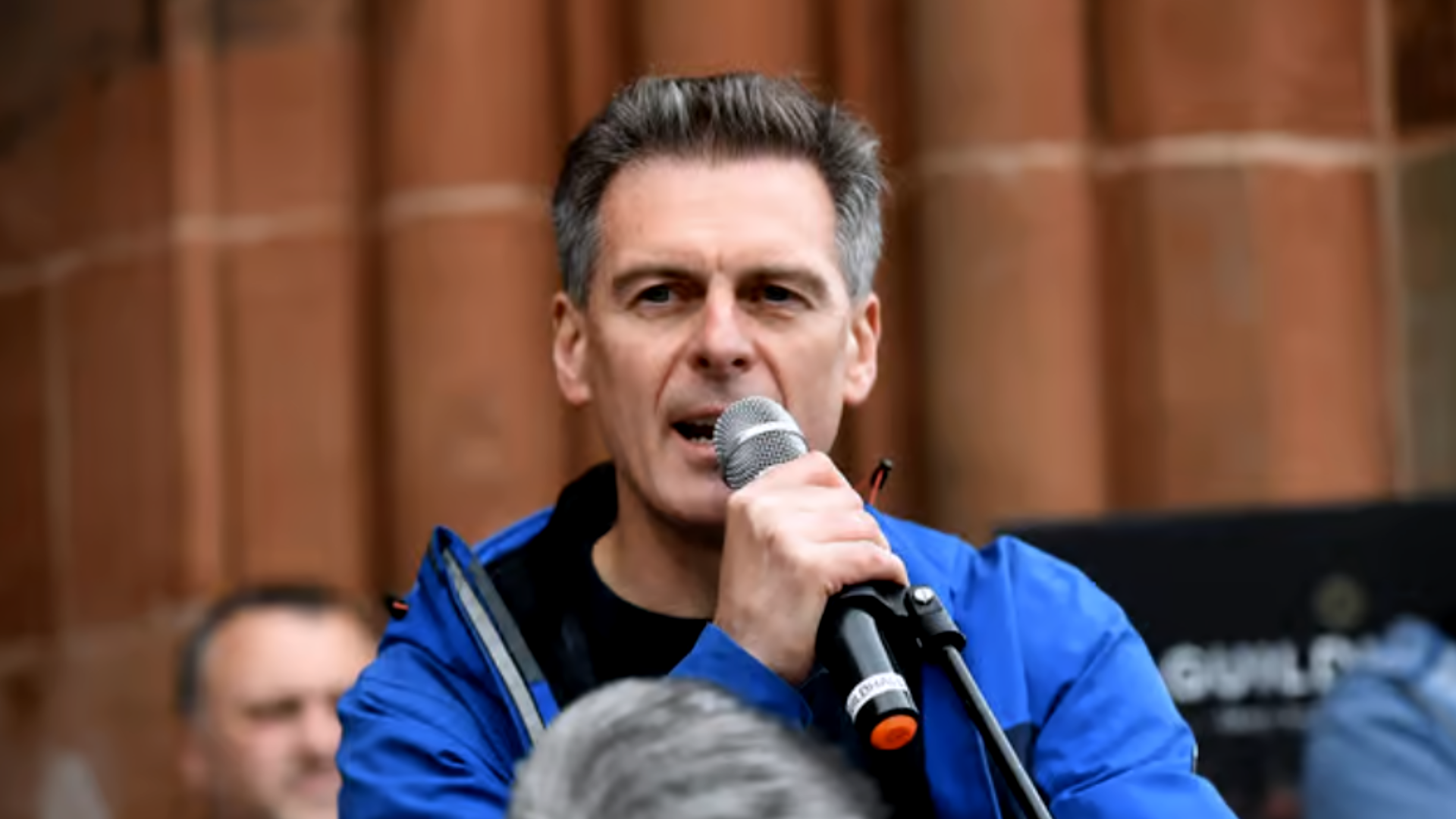 Shaun Harkin speaking publicly at Guildhall in Derry