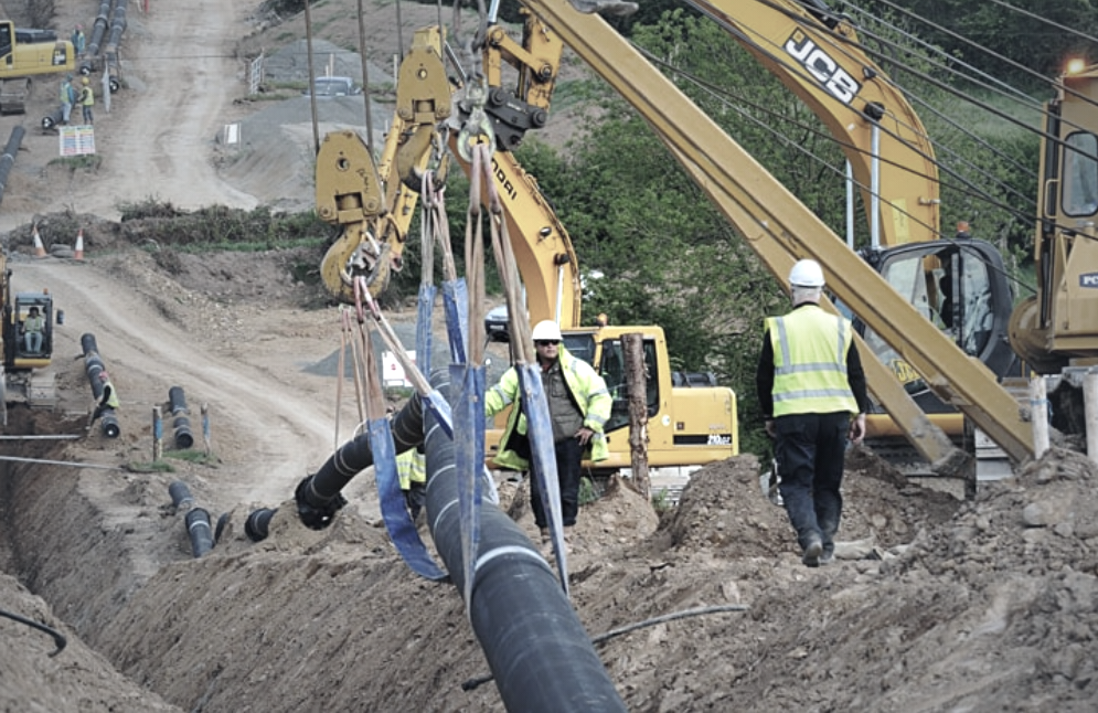 JCBs and water workers on a dig.