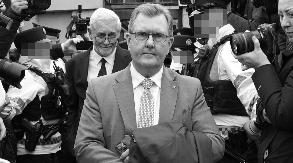 Pedophile, former NI First Minister, former DUP Leader Jeffery Donaldson and barristrer surrounded by PSNI officers and journalists outside the courthouse in Newry in 2024.