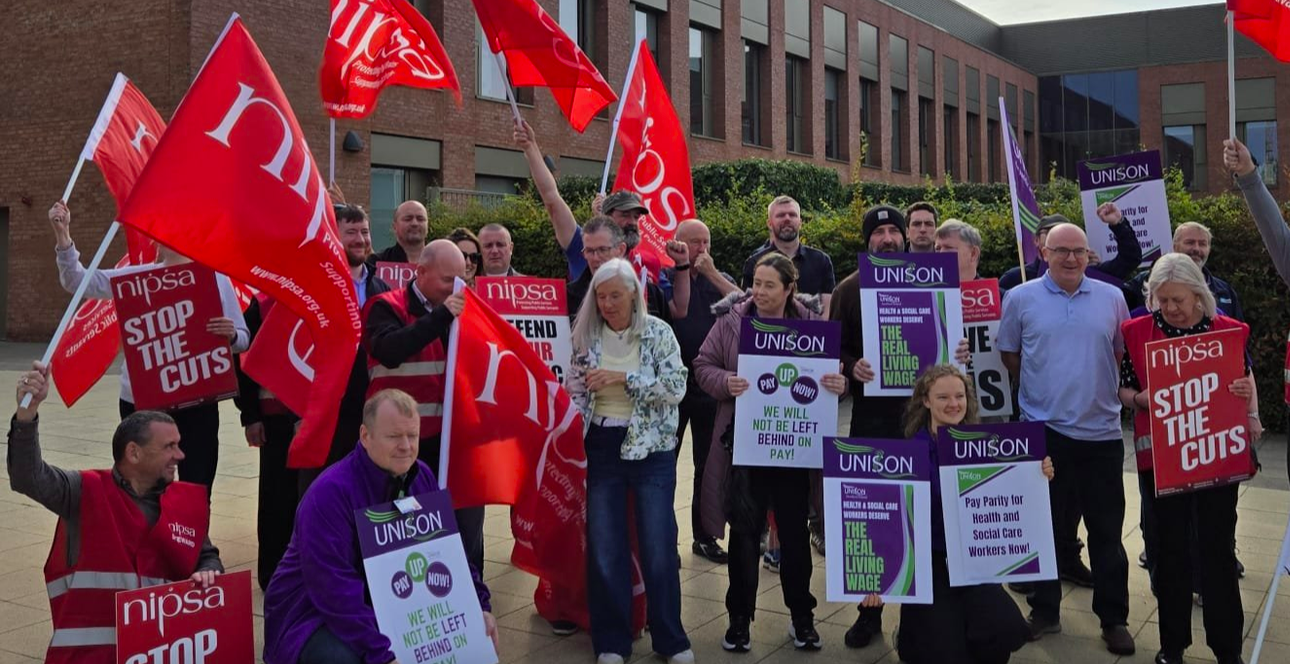 Gerry Carroll at the Royal alongside healthcare workers who are resisting cuts to the health service.