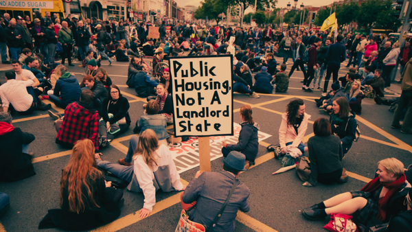 Occupation of O''Connell Bridge in 2018. Prominent placard reads 'Public Housing Not A Landlord State'