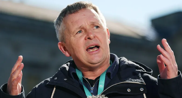Richard Boyd Barrett speaking in front of the Dáil