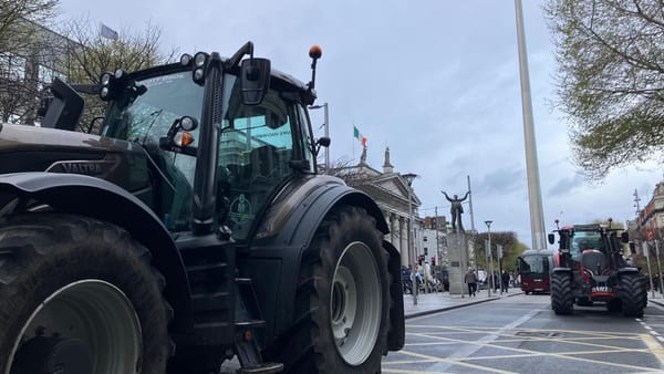 Tractors on a quiet O'Connell Street Saturday 11 April with the Jim Larkin Statue GPO and Spire in the background