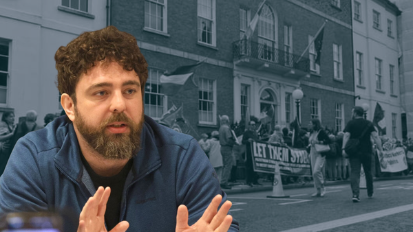 Eoghan Ó'Ceannabháin speaking to a crowd at ''Let Them Study'' demo 