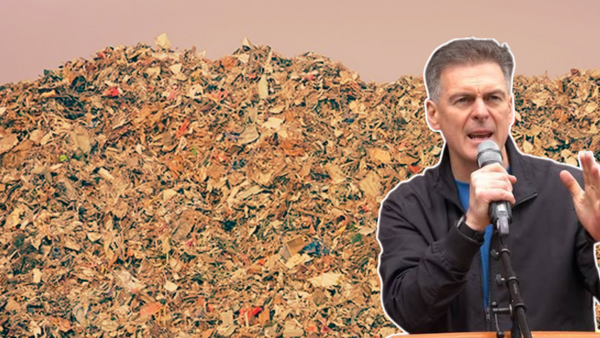 Councillor Shaun Harkin in front of Mubuoy Superdump