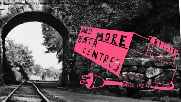 Pull the Plug No More Data Centres Art by Mary Martin over train bridge near Kilmeadan.